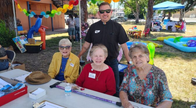 Pastor Brian and church members at Black Pride Event